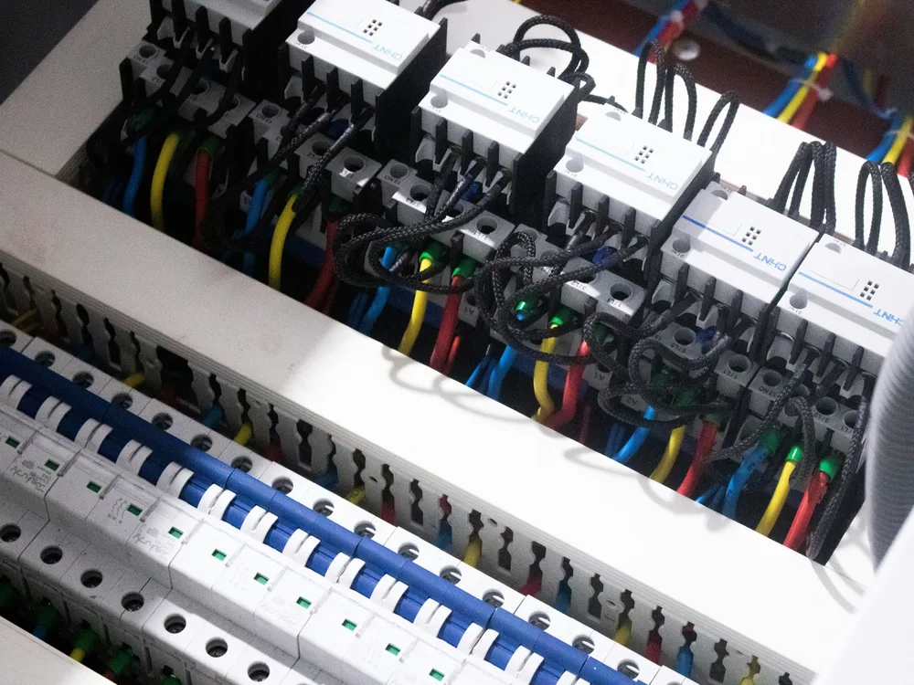 Close-up of a residential electrical panel with labeled circuit breakers, Redding, CA